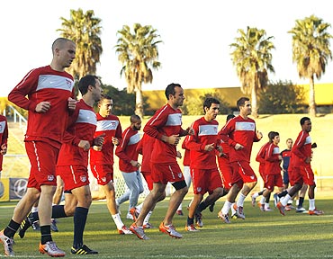 Players of the US team go through the paces at a training session