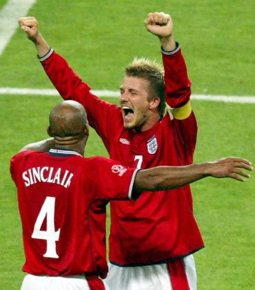 David Beckham celebrates after England beat Argentina
