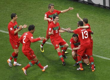 Portuguese celebrate after a goal
