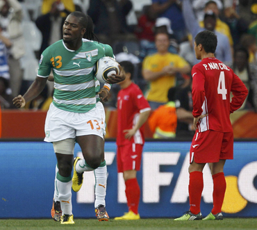 Ivory Coast's Ndri Romaric  celebrates during the 2010 World Cup Group G soccer match at Mbombela stadium in Nelspruit