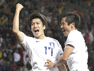 South Korea's Lee Chung-yong celebrates his goal during the 2010 World Cup second round match against Uruguay in Port Elizabeth