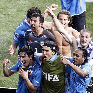 Uruguayan reacts after the win