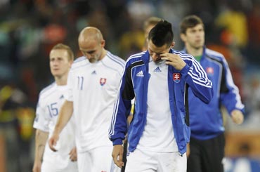 Slovakia players reacts after losing to the Netherlands