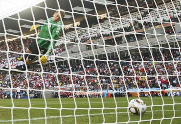 Germany's goalkeeper Manuel Neuer watches as the ball crosses the line