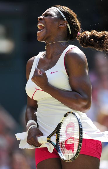 Serena Williams celebrates after beating Maria Sharapova
