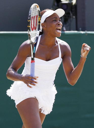 Venus Williams celebrates after beating Jarmila Groth