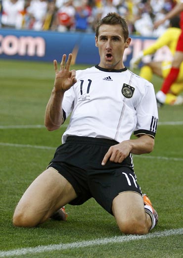 Miroslav Klose celebrates after scoring a goal