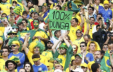 Brazilian fans show their support to coach Dunga
