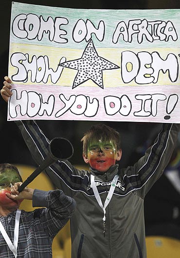 A young fan backs the Ghana team during the match against United States