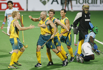 Australia's Glenn Turner celebrates the team's second goal during their match against India at the men's Hockey World Cup
