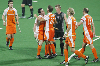 The Netherlands' Jeroen Hertzberger celebrates with teammates after scoring a goal against New Zealand