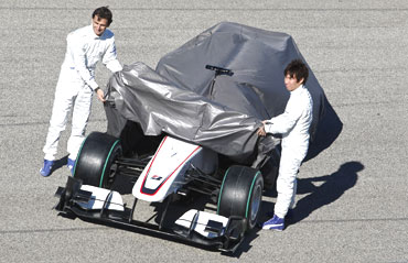 Pedro de la Rosa and Kamui Kobayashi unveil the new car