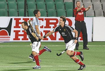Germany's Matthias Witthaus (left) celebrates with his team-mate Jan-Marco Montag after scoring
