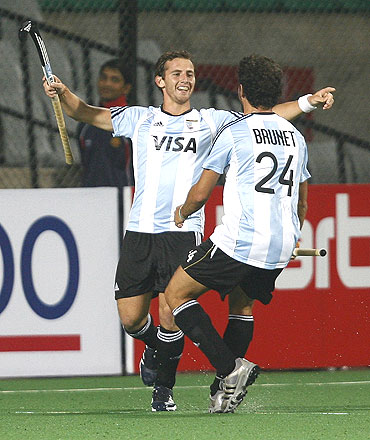 Argentina's Lucas Martin Vila (left) celebrates with team-mate Manuel Brunet after scoring