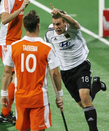 Germany's Korn celebrates after scoring as Netherlands' Taekema watches on