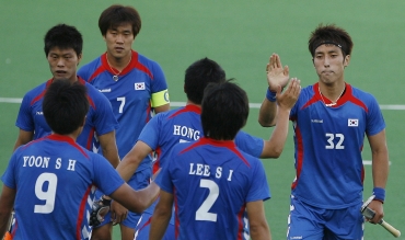 Jong Hyun Jang celebrates after scoring a hat-trick