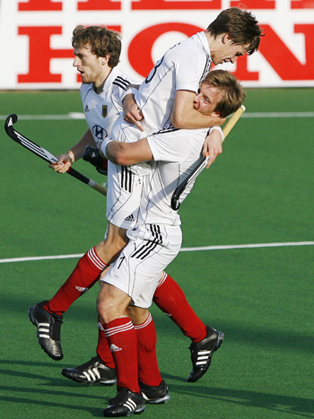 Germany's Menke celebrates after scoring the first goal during their match against New Zealand at the men's Hockey World Cup