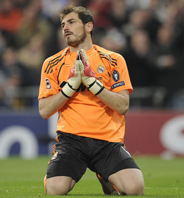 Iker Casillas reacts after conceding a goal