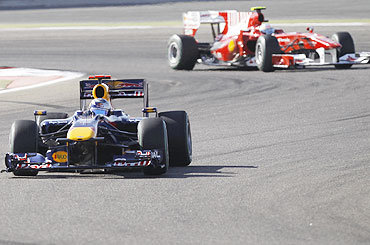 Sebastian Vettel leads Ferrari's Fernando Alonso during the Bahrain GP