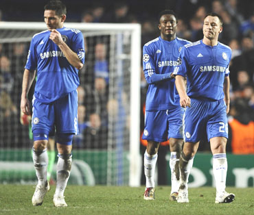 Chelsea players dejected after losing the second leg match
