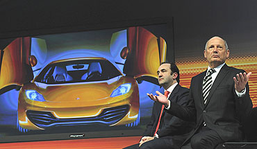 McLaren Automotive executive chairman Ron Dennis (right) and managing director Antony Sheriff address the media during the unveiling of the car
