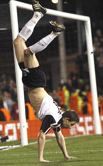 Zoltan Gera of Fulham is cock-a-hoop after scoring against Juve