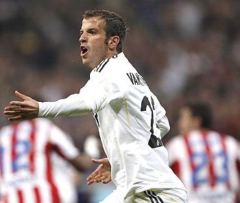 Real Madrid's Rafael Van der Vaart celebrates after scoring against Sporting Gijon