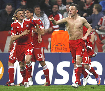 Bayern Munich's Ivica Olic (right) celebrates after scoring against Manchester United