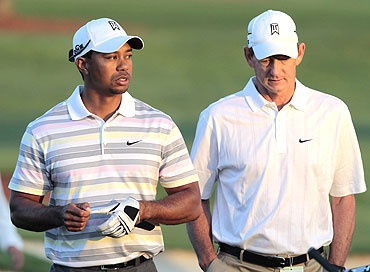 Tiger Woods (left) with former coach Hank Haney