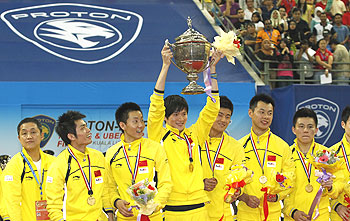 The Chinese team celebrates after winning the Thomas Cup on Sunday