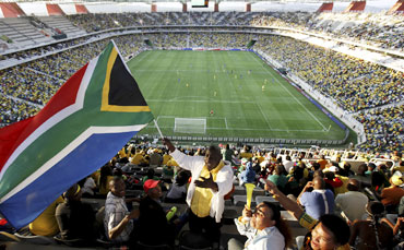 A fan waving South Africa's flag