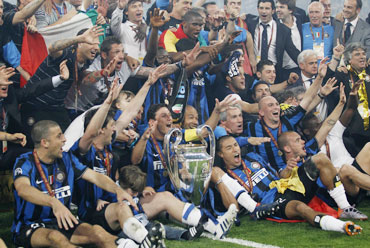 Inter Milan players celebrate after winning the trophy