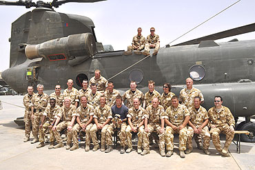 England footballer David Beckham (front row, 6th from right) is seen with the engineers of the CH47 Chinook Engineering Flt, 1310 Flight, Royal Air Force, Joint Helicopter Force (Afghanistan) Squadron, during a visit to camp Bastion, in Afghanistan