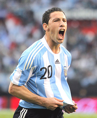 Argentina's Maxi Rodriguez celebrates after scoring against Canada