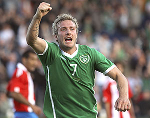 Ireland's Liam Lawrence celebrates after scoring against Paraguay