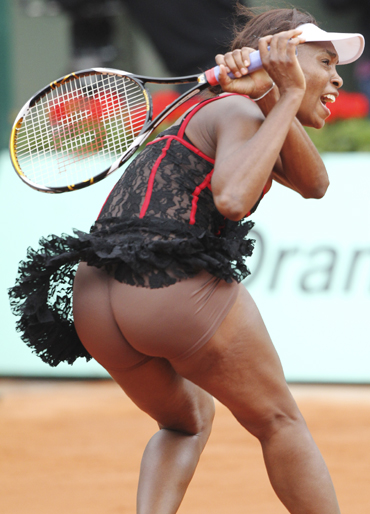 Venus Williams of the U.S. plays a shot during her match against Arantxa Parra Santonja of Spain