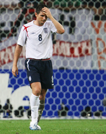 England's Frank Lampard reacts after missing penalty during penalty shootout in World Cup 2006 quarter-final soccer match