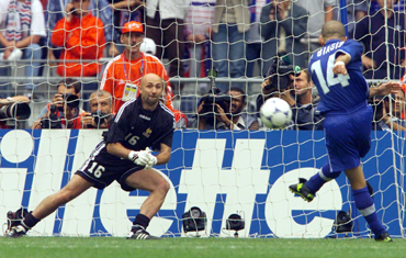 Italy's Luigi Di Biagio shoots his crucial penalty shot which was saved by French goalkeeper Fabien Barthez