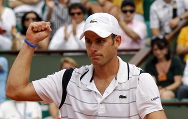 Andy Roddick reacts after winning the match