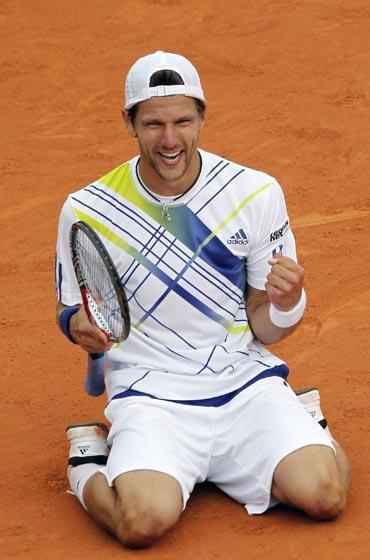 Jurgen Melzer celebrates after defeating David Ferrer