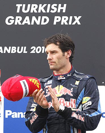 Red Bull's Mark Webber on the podium after finishing 3rd