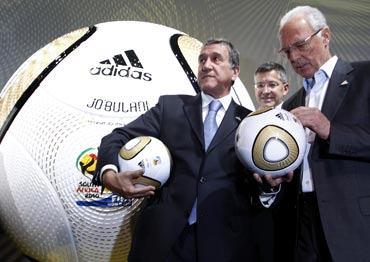 Franz Beckenbauer with the World Cup ball