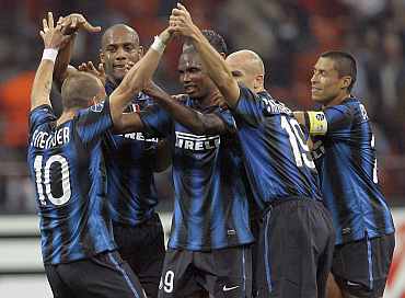 Inter Milan players celebrate after wining their match