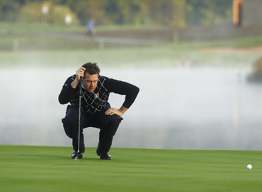 European Ryder Cup player Lee Westwood of England lines up his putt