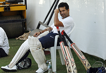 Sachin Tendulkar relaxes during a practice session in Ahmedabad on Monday
