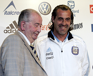 President of the Argentine Football of Association Julio Grondona (left) with Argentina's  newly appointed coach Sergio Batista in Buenos Aires