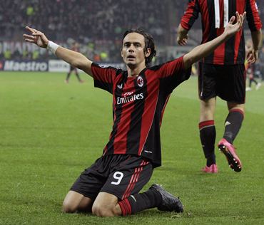 AC Milan's Filippo Inzaghi celebrates after scoring against Real Madrid