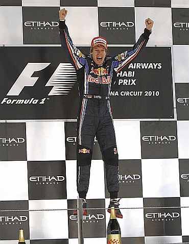 Sebastian Vettel celebrates after winning the F1 Grand Prix