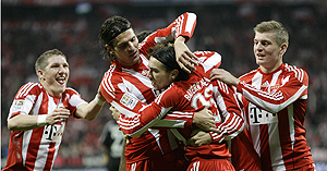 Bayern Munich players celebrate after scoring against Nuremberg on Sunday