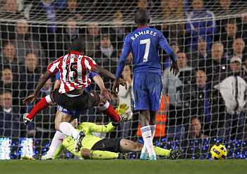 Nedum Onuoha scores past Chelsea's Peter Cech